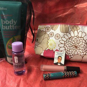 Lg Floral Clinique Bag with mixed beauty products